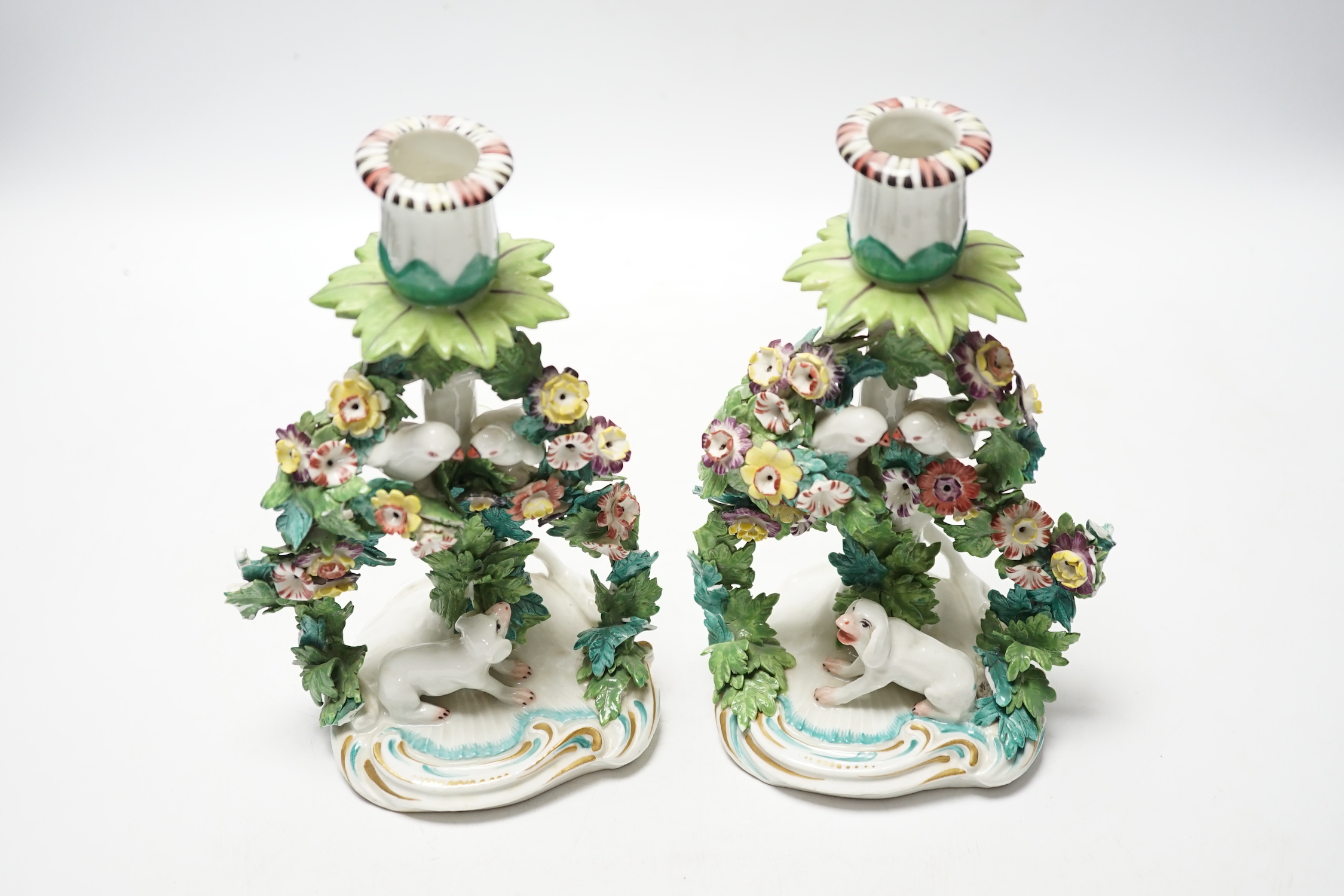 A pair of Samson porcelain chambersticks, in Derby style, with floral encrusted decoration, 19cm high